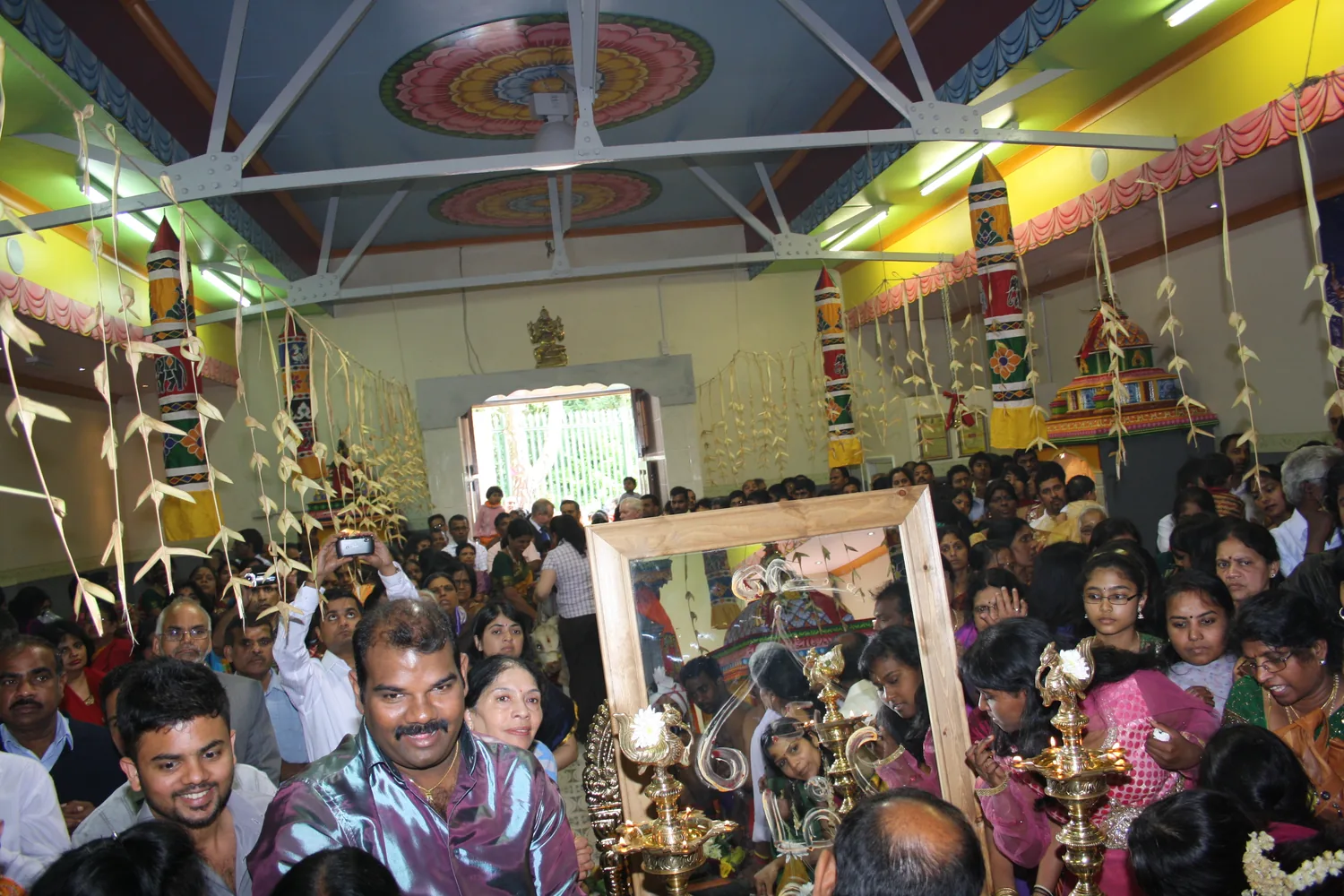The hall at its fullest, the congregation pressed in on every side.