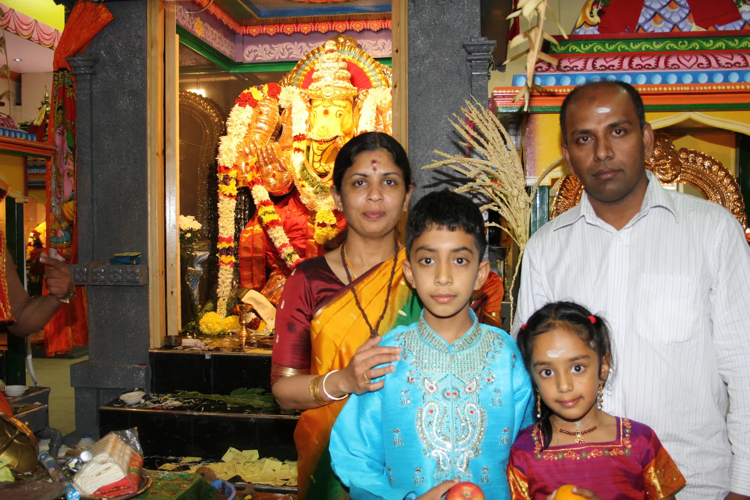 A family before the shrine.