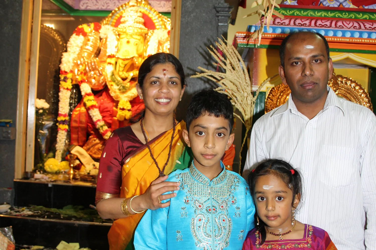 A family before the shrine.
